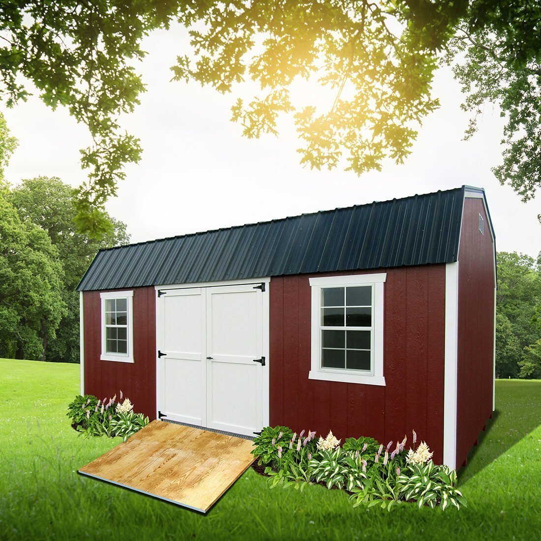 Maroon northeast dutch barn with white trim and black metal roof