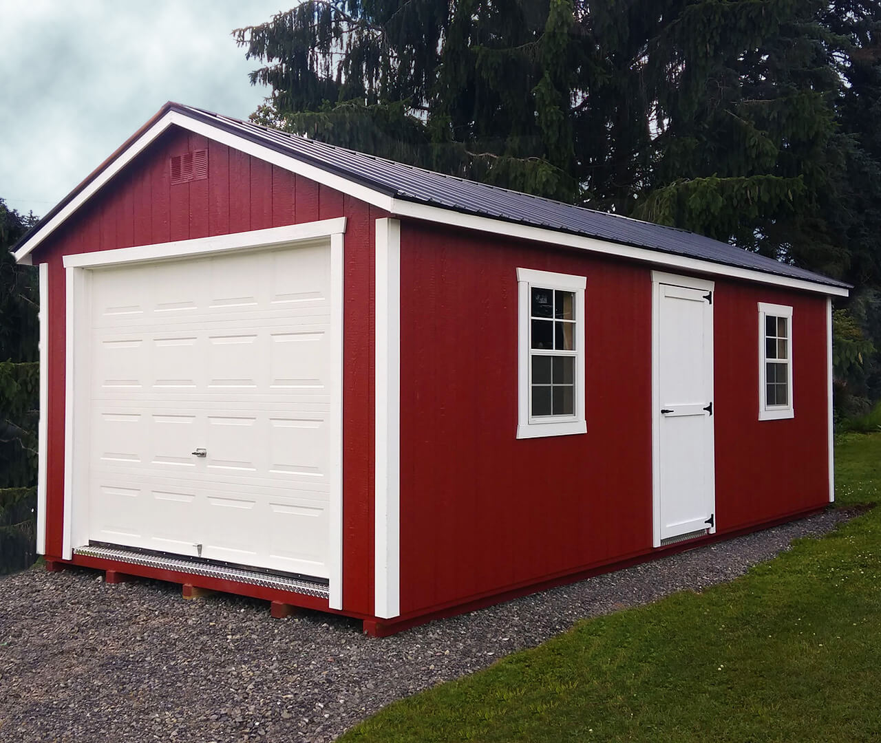 Red shed with white trim