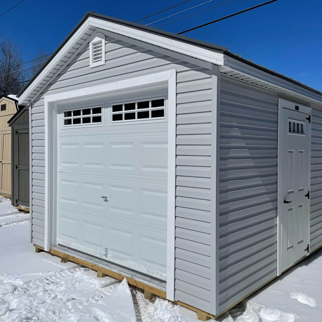 Gray gable garage in the snow